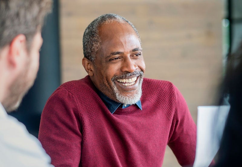 Man learning about Finance of America