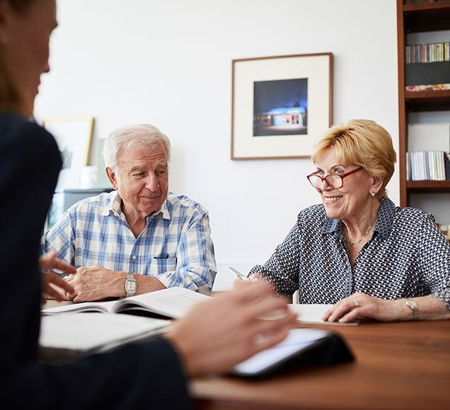 Couple receiving help applying for their HomeSafe Second reverse mortgage loan