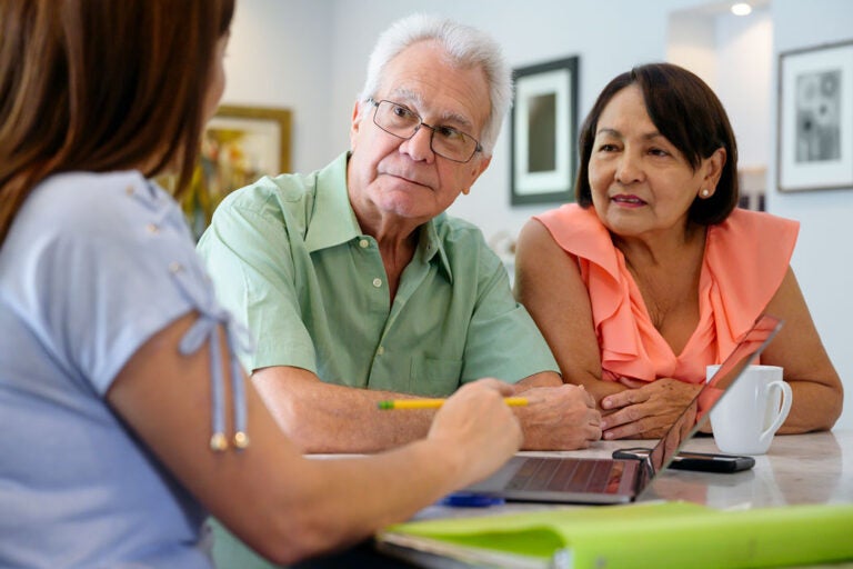 People learning how to refinance a reverse mortgage