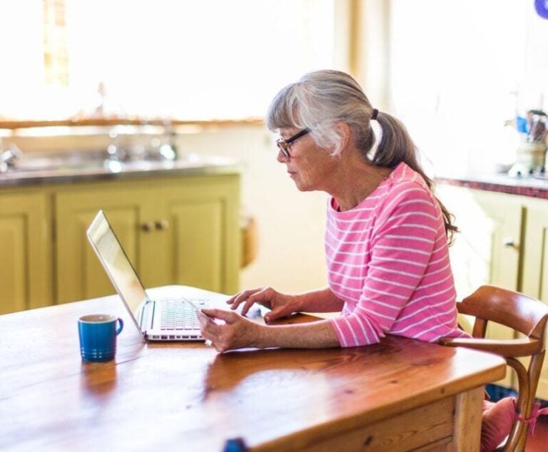 A woman learning about a reverse mortgage with bad credit